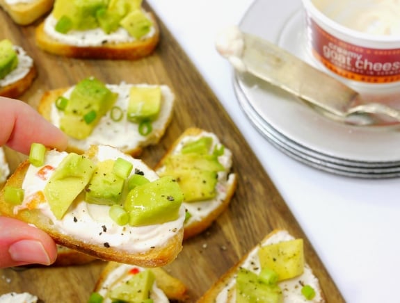 Creamy Roasted Red Pepper Goat Cheese and Avocado Crostini  from Noble Pig yum