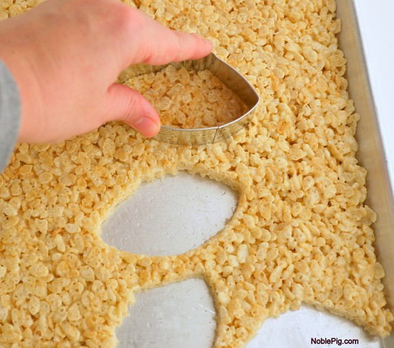Football Inspired Rice Krispies Treats cutting out the shapes
