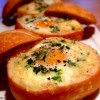 Baked Eggs in Bread Bowls
