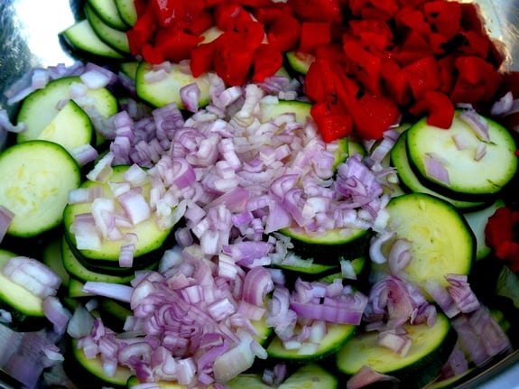 Sliced zucchini, chopped red peppers, chopped red onion.