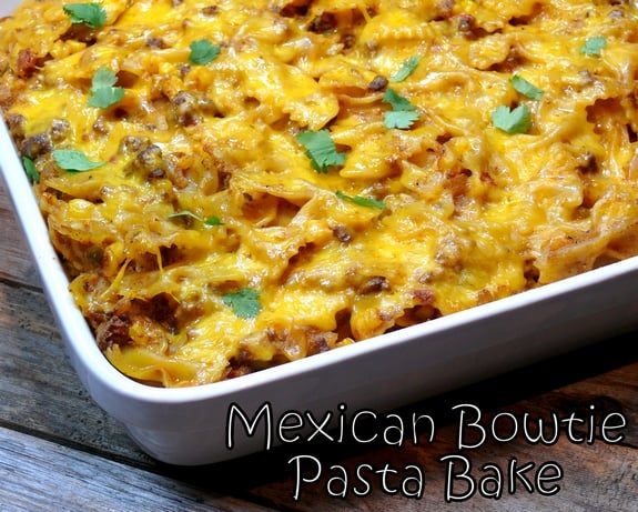 VIDEO + Recipe: Garnish this MEXICAN BOWTIE PASTA BAKE with fresh avocado, sour cream, cilantro and a favorite hot sauce. Makes for great leftovers too from NoblePig.com. #noblepig #cincodemayo #pasta #casserole #mexican