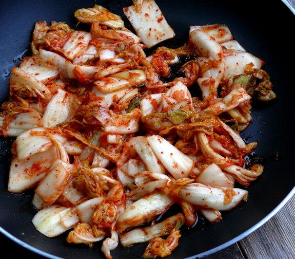 Cheesy Kimchi Colcannon Kimchi warming in pan