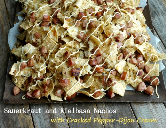 Sauerkraut and Kielbasa Nachos with Cracked Pepper Dijon Cream aerial view