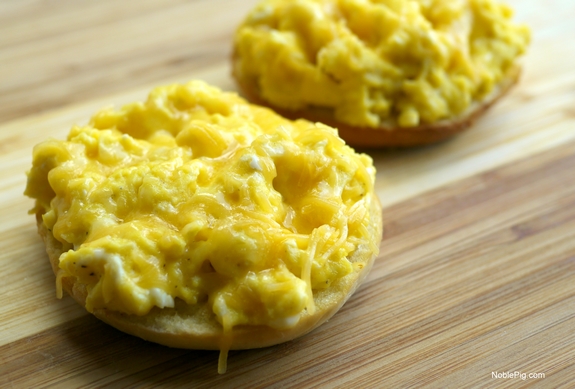 Cheesy eggs on a bagel.