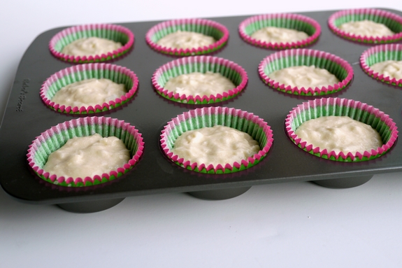 Coconut Overload Cupcake batter in muffin tins with cupcake liners.