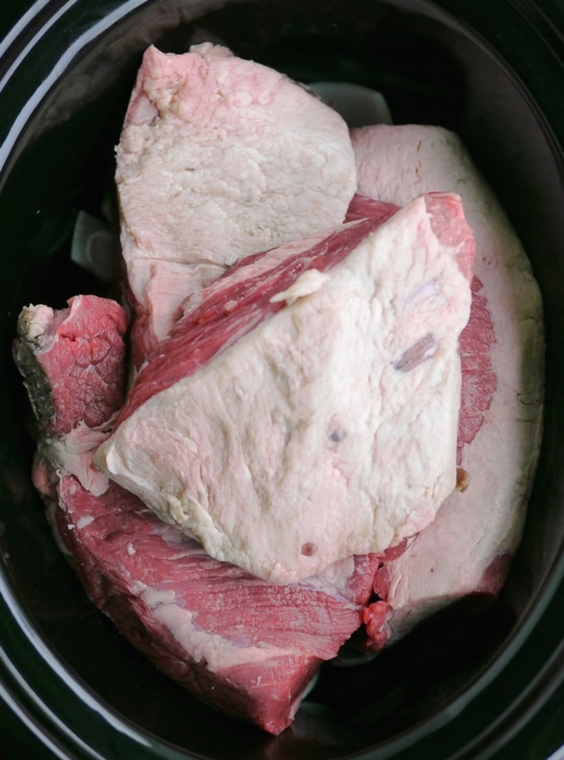 The Best Tasting Slow Cooker Tangy Brisket will become a family favorite for years to come. The fork-tender, melt in your mouth meat and mouthwatering sauce are a true example of what brisket is supposed to taste like. #noblepig #slowcooker #slowcookerbrisket #beef #easydinners