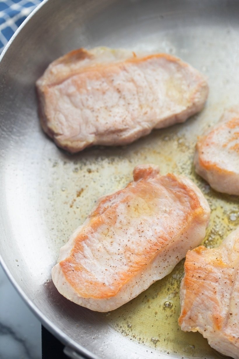 pork chops in a pan