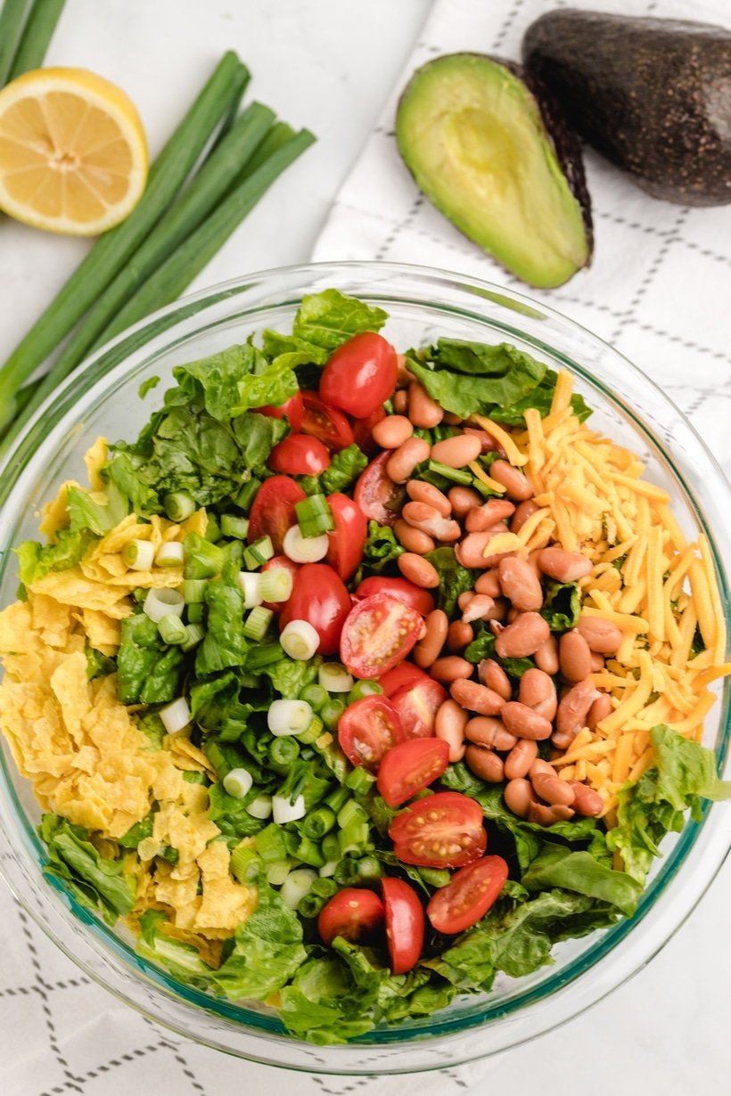 Mexican Salad with a Creamy Avocado Dressing is the perfect accompaniment to a heavy Mexican style meal. You can't beat the fresh flavors and colorful ingredients of this popular Mexican side dish.