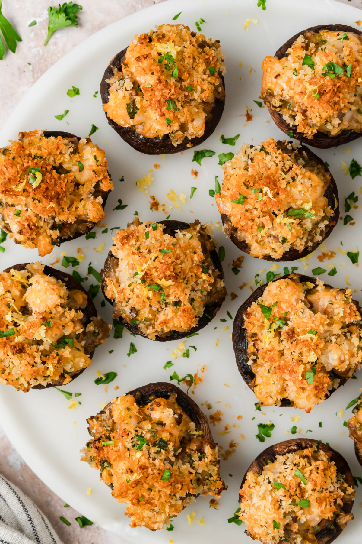 Baked Shrimp Stuffed Mushrooms with Parmesan Panko Baked shrimp stuffed mushrooms with golden Parmesan panko, parsley and lemon zest