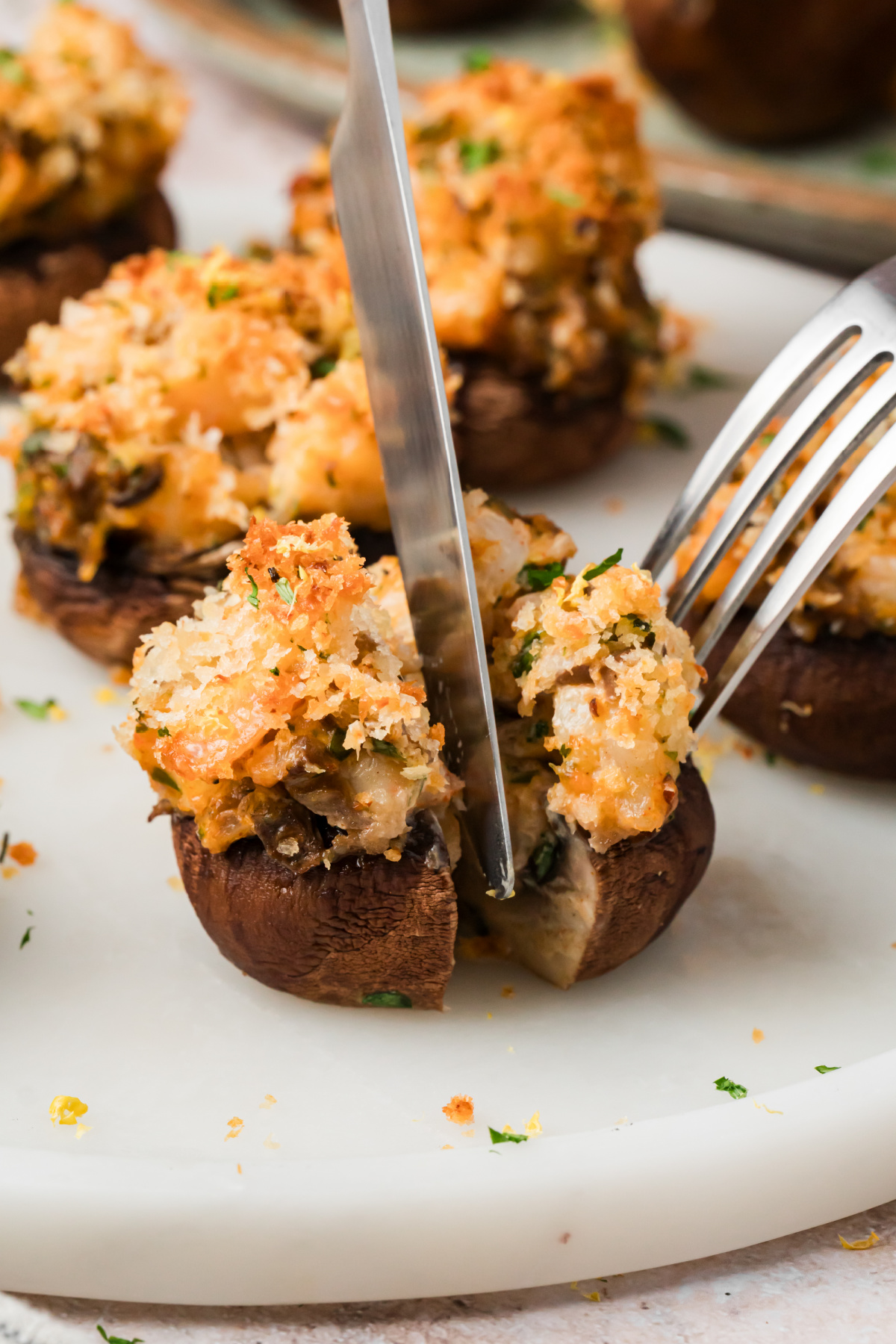 Shrimp Stuffed Mushroom Cut Open Shrimp stuffed mushroom cut open to show the shrimp, cream cheese and mushroom filling
