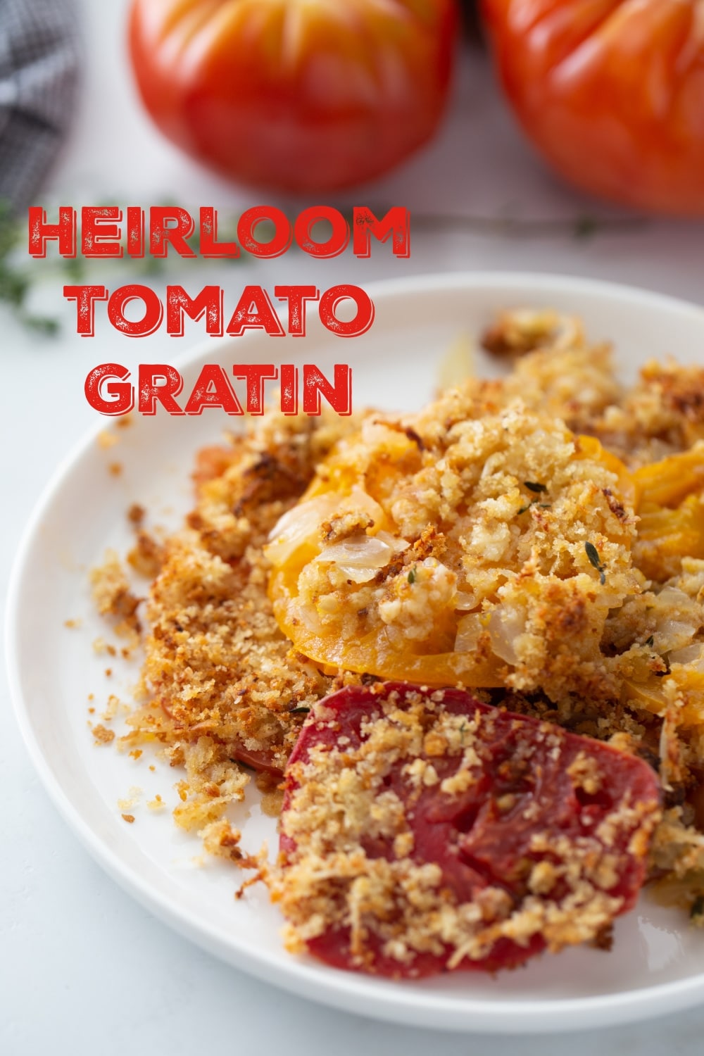 Heirloom tomatoes are sweet, plump and full of the best flavor. This tomato gratin is packed with ingredients that truly enhance the end of summers best gift. via @cmpollak1