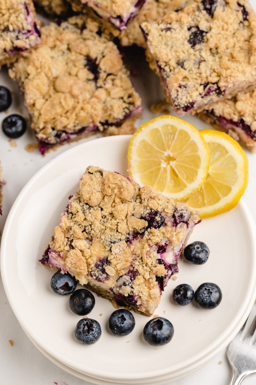 Blueberry Streusel Bars with Lemon-Cream Filling are a foolproof recipe, made especially to persuade the dessert averse. These tempting bars highlight the addictive balance of tart and sweet - crunchy and chewy when it comes to indulging in a sweet treat.