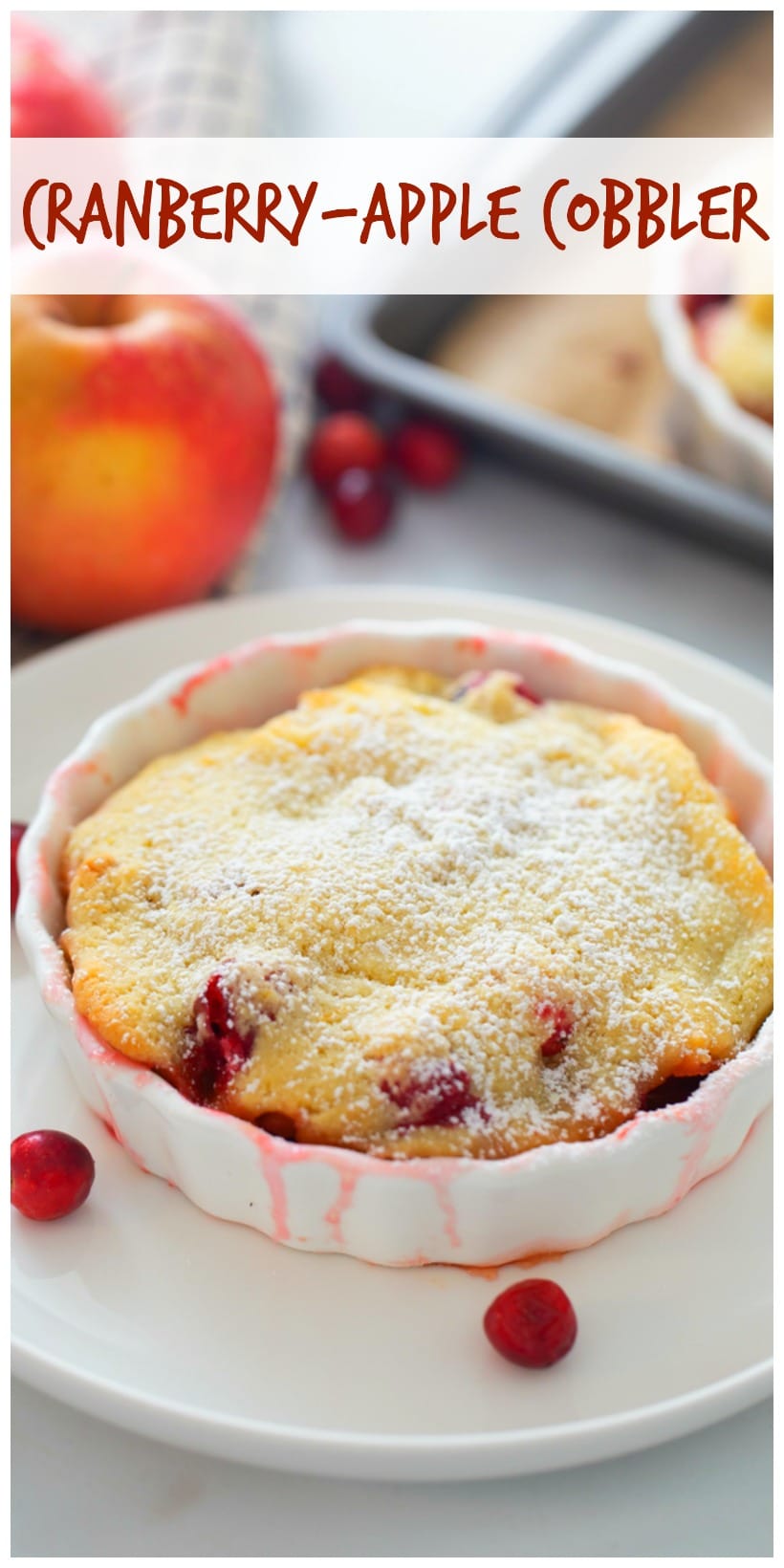 Cranberry-Apple Cobbler takes full advantage of in season, fall fruit. Sweet apples and tart cranberries make a layer of undeniably juicy and festive looking fruit. However, it's the buttery topping that puts it all over the top! via @cmpollak1