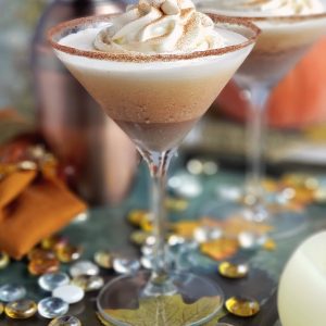 Pumpkin pie martinis on a tray.
