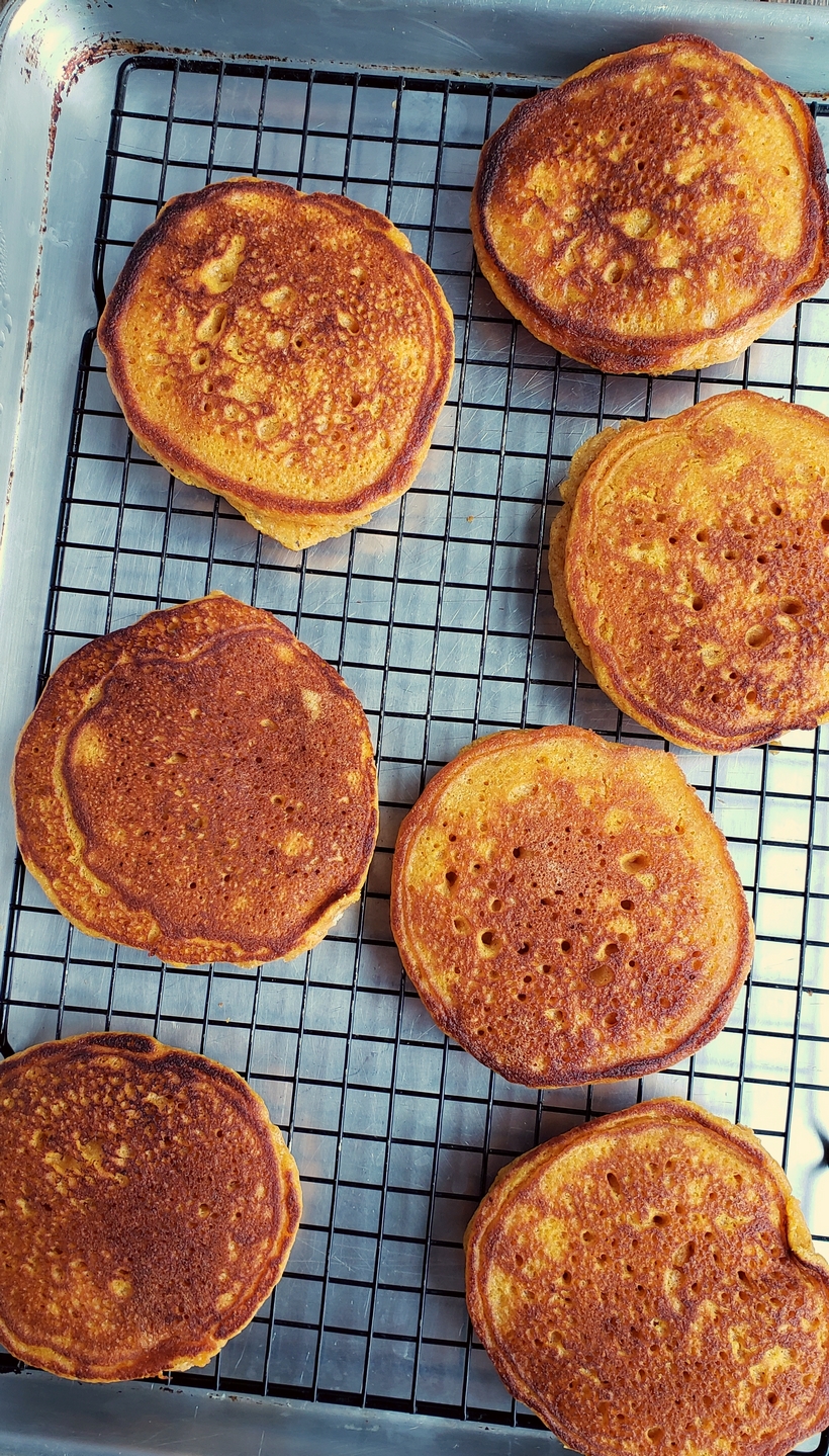 pumpkin pancakes on a cooling rack