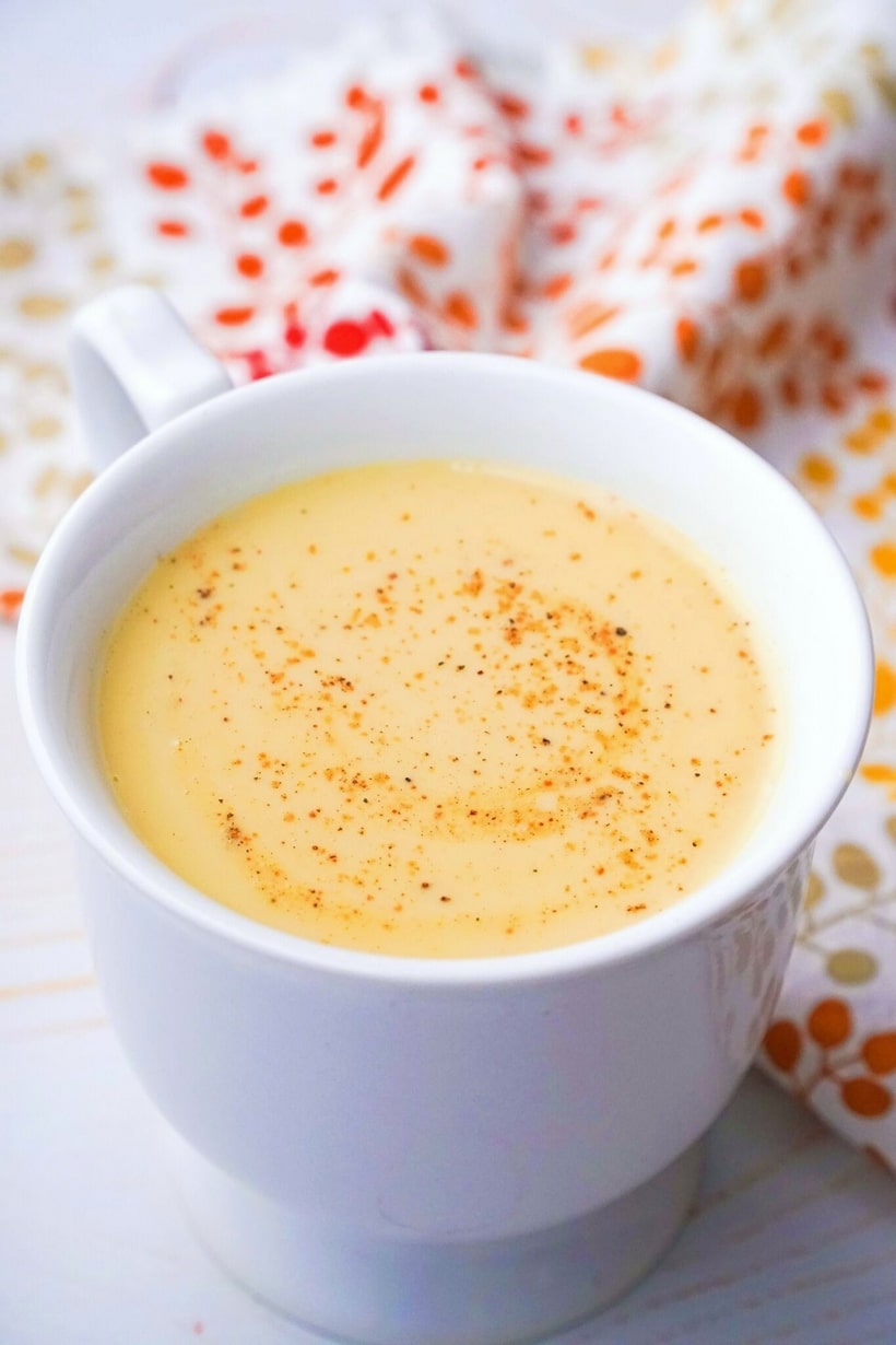 If you love the flavors of chai and have a weakness for eggnog, this homeade Chai Eggnog is the ultimate holiday sipper. For a spiked version, a generous shot of brandy, whisky or rum added to this delicious, drinkable custard would put everyone into the holiday spirit. #noblepig #chai #chaieggnog #eggnog #holidaydrink #nonalcoholicholidaydrink #chaitea #holidaycocktail #partydrink #christmasdrink #holidaydrinksforacrowd