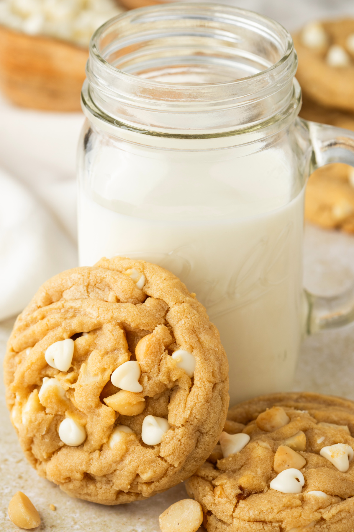 white chocolate macadamia cookies served with milk showing soft texture and white chocolate chips