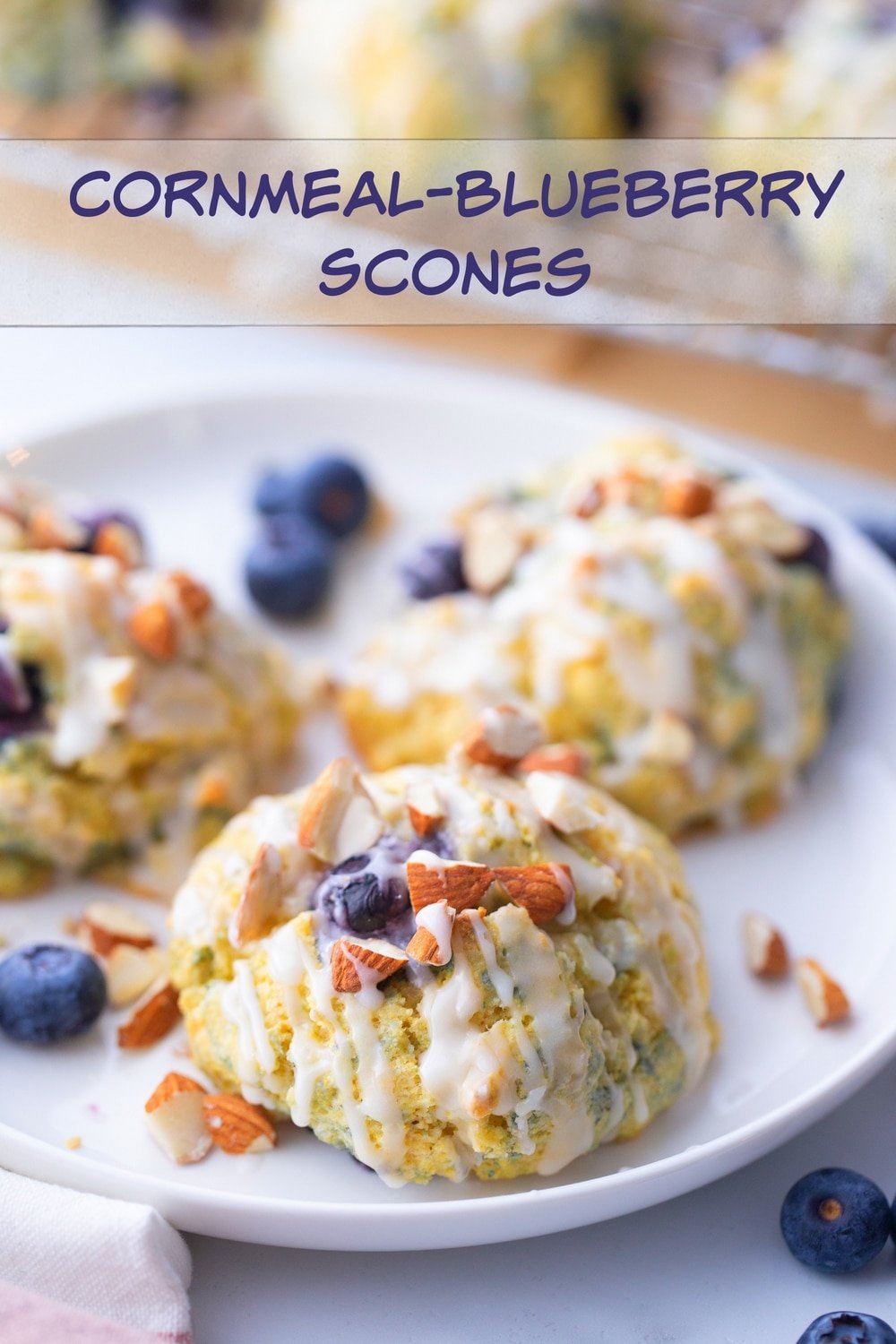 Cornmeal-Blueberry Scones, a welcomed, toothsome treat bursting with sweet blueberries, cornmeal and zippy lime juice and zest to tie all the flavors together. via @cmpollak1