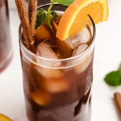 Iced tea in a glass with orange slice