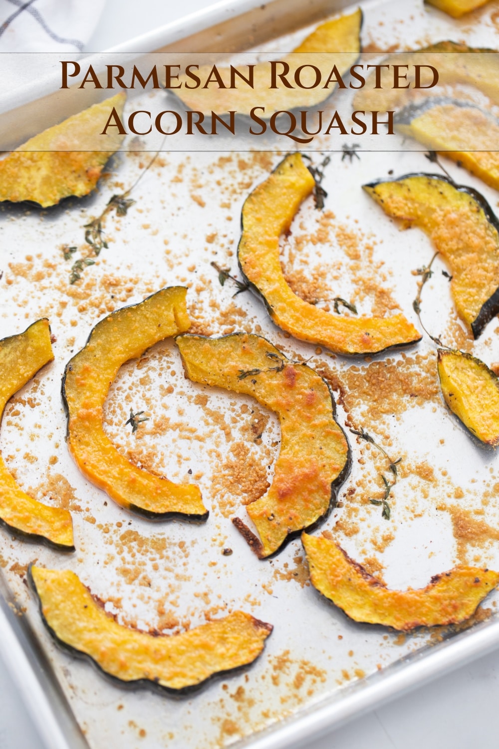 Roasted Acorn Squash - with a drizzle of olive oil, a sprinkle of woody-spiced thyme, a generous dusting of freshly grated Parmesan, and a little solo session in the oven, you're just moments away from savoring this seasonal squash for dinner. via @cmpollak1