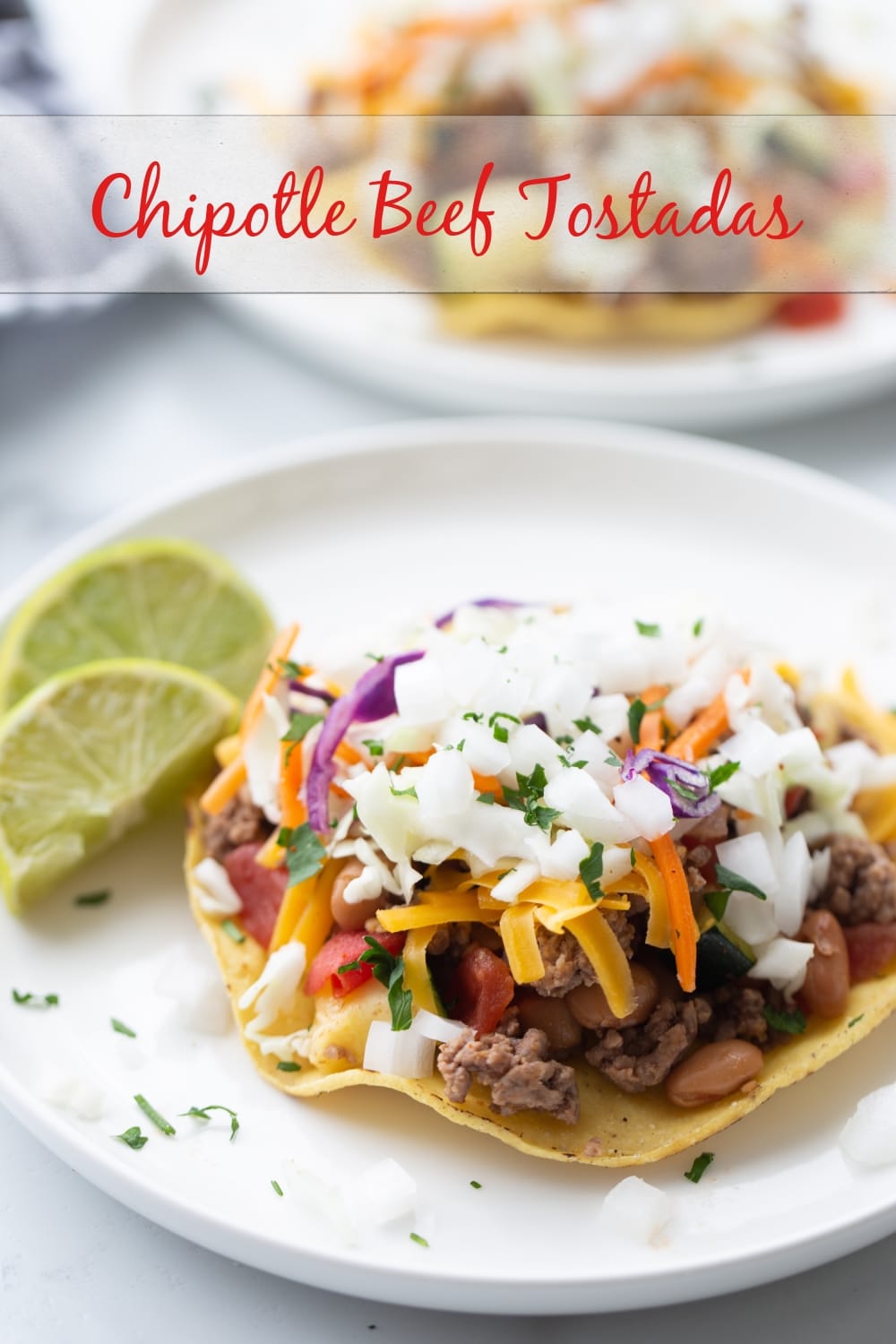 Chipotle Beef Tostadas - crunchy tortillas topped with a flavor packed beef and veggie mixture. This is an easy last minute meal that feels a little more sophisticated.  via @cmpollak1
