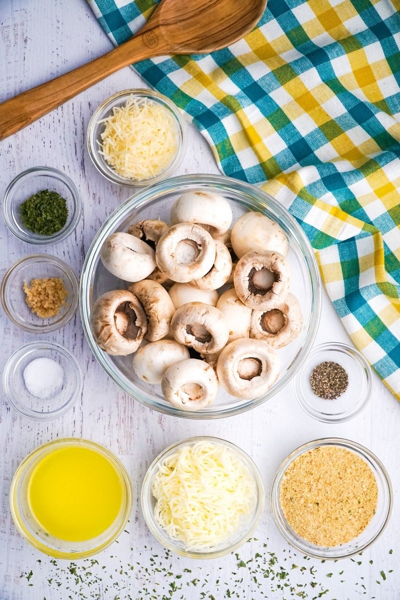 These Italian Stuffed Mushrooms are the perfect party appetizer for any occasion. Put these stuffed mushrooms together early in the day and bake them off right before guests arrive. #noblepig #mushrooms #italianstuffedmushrooms #partyappetizer #partyappetizerforacrowd #mushrromappetizer #stuffedmushrooms #italianfood #italianappetizer #partyfood