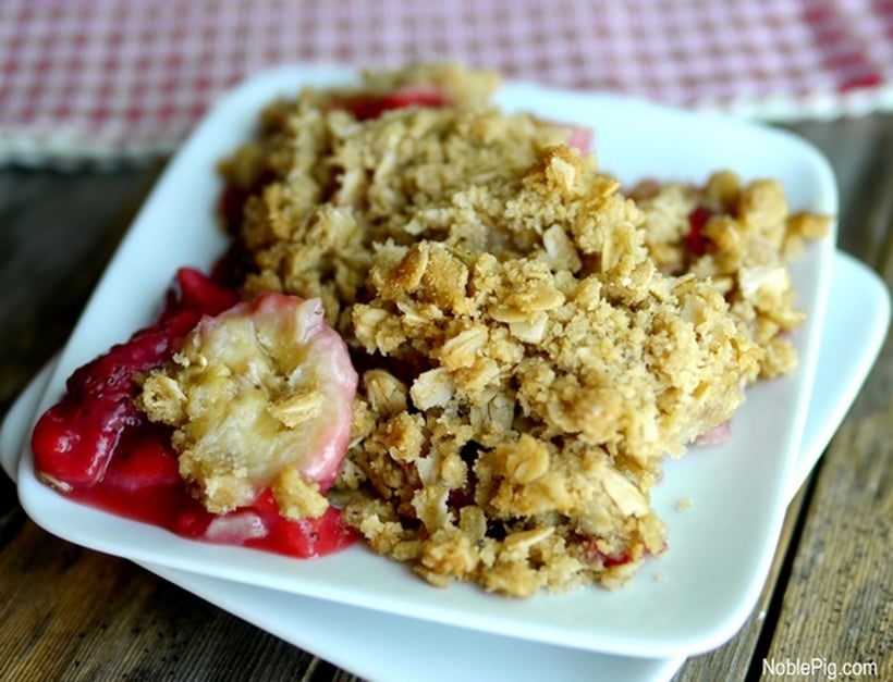 Strawberry-Banana Crumble on a white plate.