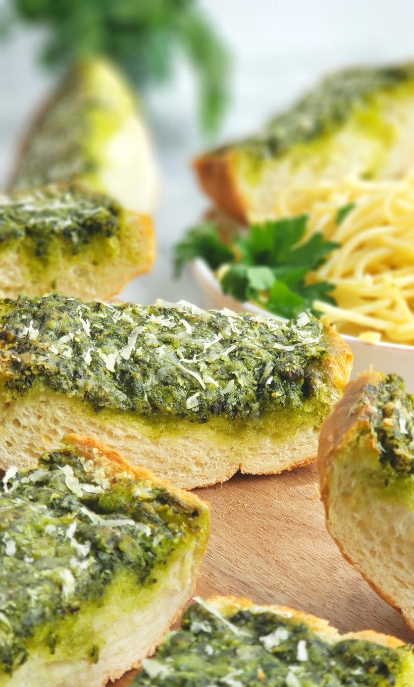 Use up your  leftover parsley with this deliciously, flavorful Garlicky, Cheesy Parsley Bread. It's the perfect side dish for a bowl of pasta. #noblepig #parsley #garlicbread