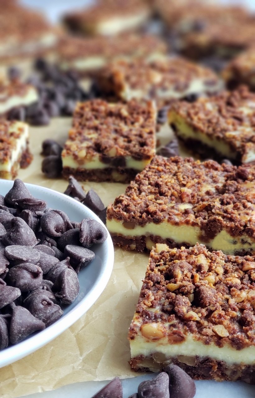 Perfect for any occasion, these Chocolate Cream Cheese Bars feature a unique chocolate graham cracker crust and topping, with a creamy middle layer. #creamcheesedessert