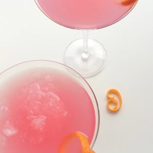 Overhead shot of the World's Best Cosmopolitan Cocktail in two glasses.