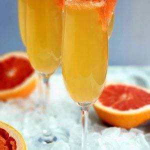 Grapefruit Prosecco Cocktails on a tray with ice.