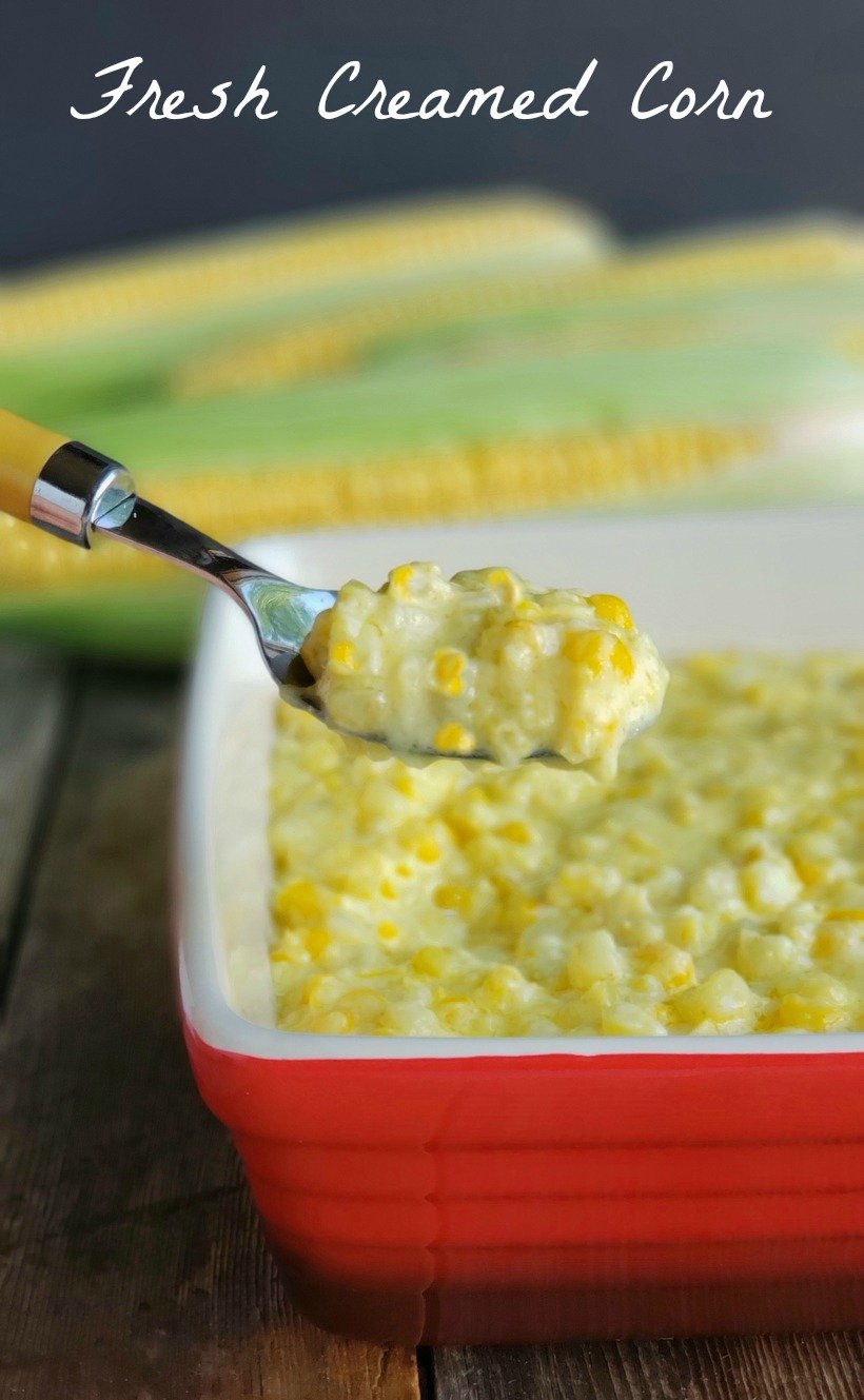 Fresh creamed corn in text with finished dish in a red serving tray with a spoon scooping some out.