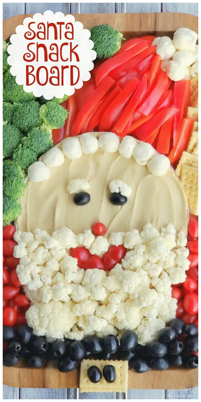 Text overlay that reads Santa Snack Board and vegetables made to look like Santa.