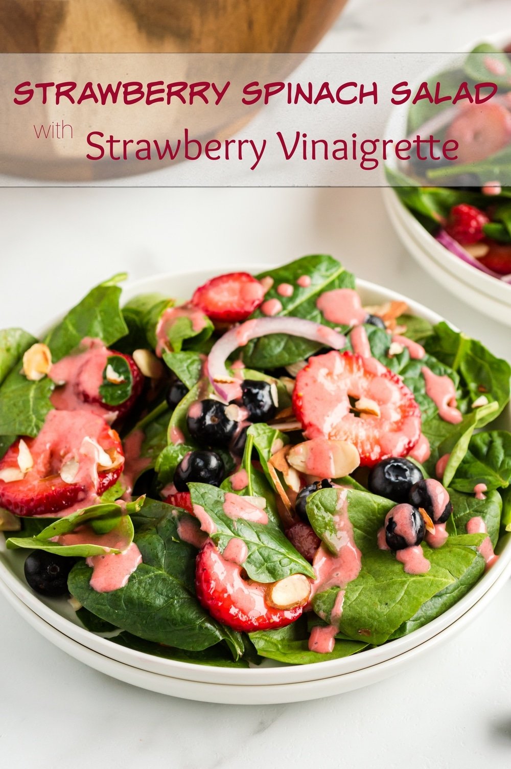 A berry driven spinach salad both adults and kids will love. A simple strawberry vinaigrette that not only perks up the greens, but is pleasing on the eyes. via @cmpollak1