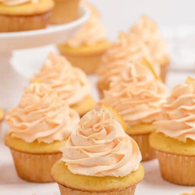 dreamy orange cupcakes with whipped orange frosting