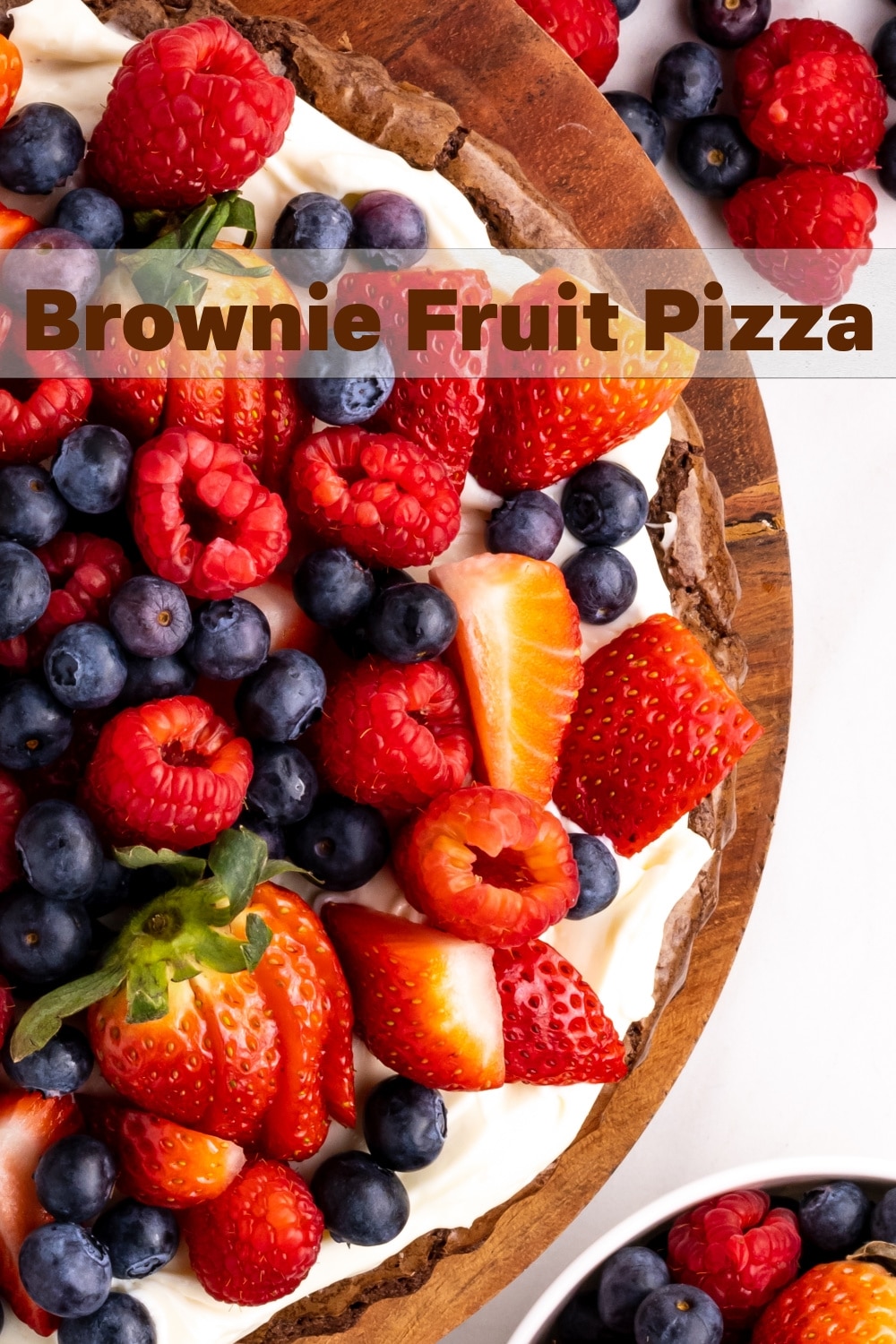 If you're looking for a simple and visually appealing dessert to serve at your upcoming celebrations, this fruit pizza with a brownie crust and cream cheese frosting, is one to consider. Think of this rich, pretty and decadent dessert as a much more fun version of a classic fruit tart. via @cmpollak1