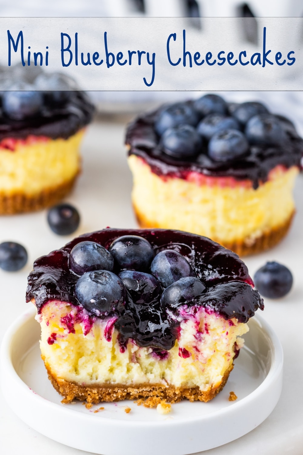 Topped with fresh, juicy blueberries and blueberry sauce, these mini blueberry cheesecakes are ready to make an appearance at all your summer gatherings. This simple recipe is easy to pack up and take to every barbecue this season. via @cmpollak1