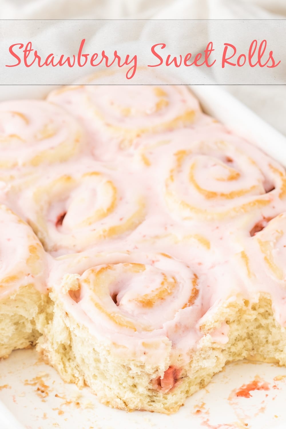 A summery twist on gooey cinnamon rolls, these strawberry sweet rolls, with strawberry glaze are the ultimate breakfast treat. So good for weekend brunch or a special celebration. via @cmpollak1