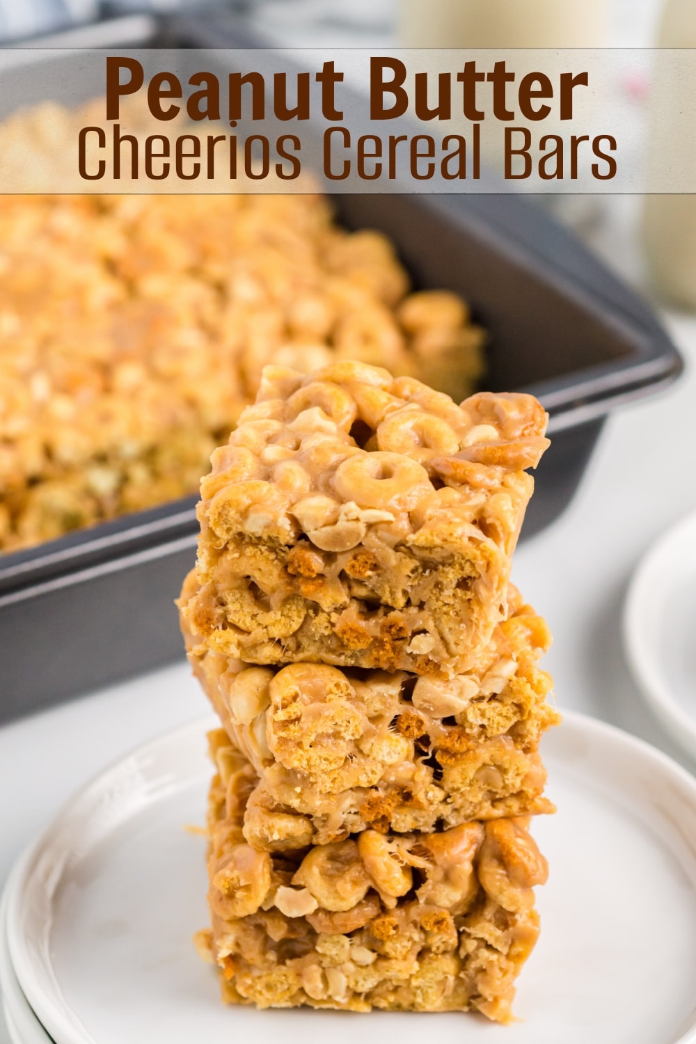 Looking for a quick and tasty snack? Try these delicious Peanut Butter Cheerio Bars. This easy recipe for Cheerios cereal bars is perfect for satisfying your sweet tooth and there isn't a better time than back-to-school season to enjoy them.  via @cmpollak1
