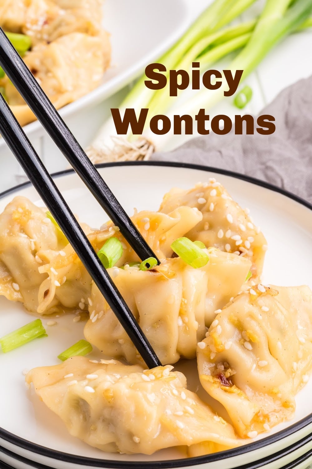 Spice up your meal with these mouthwatering spicy wontons! Made with fresh garlic, ginger, and a blend of seasonings, they're a crowd-pleaser. via @cmpollak1