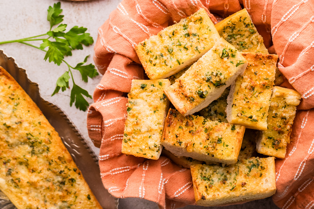 Garlic confit air fryer bread cut into pieces with crisp edges and a soft center