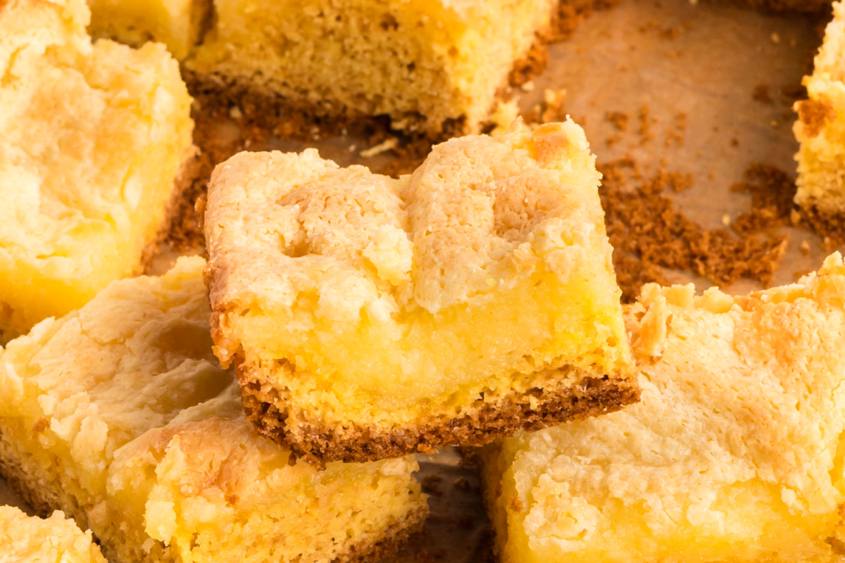 Close-up of gooey butter cake showing the creamy center, tender cake layer, and lightly crisped top.