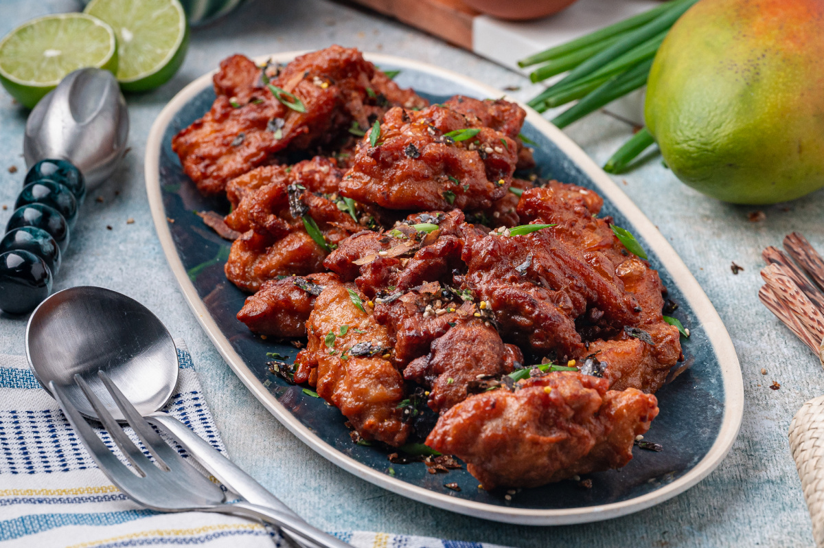 crispy mochiko fried chicken on platter with furikake
