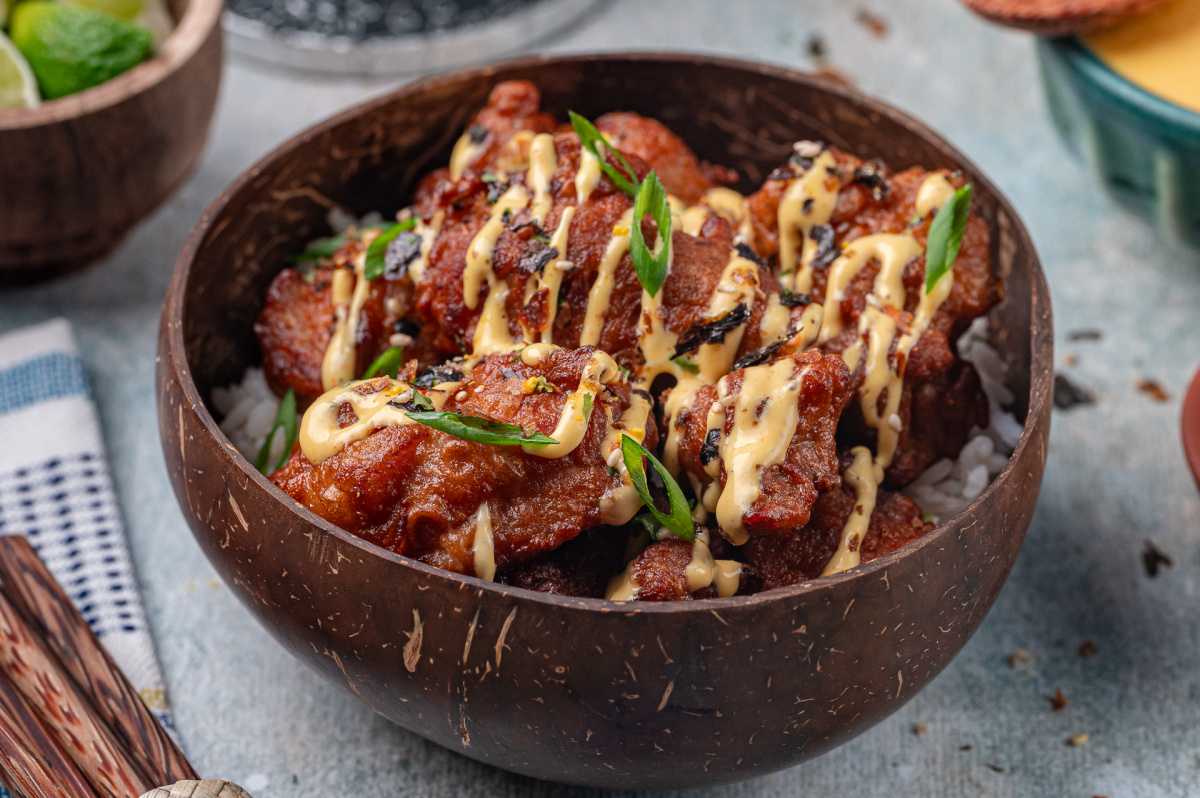 crispy mochiko chicken over rice with mango aioli
