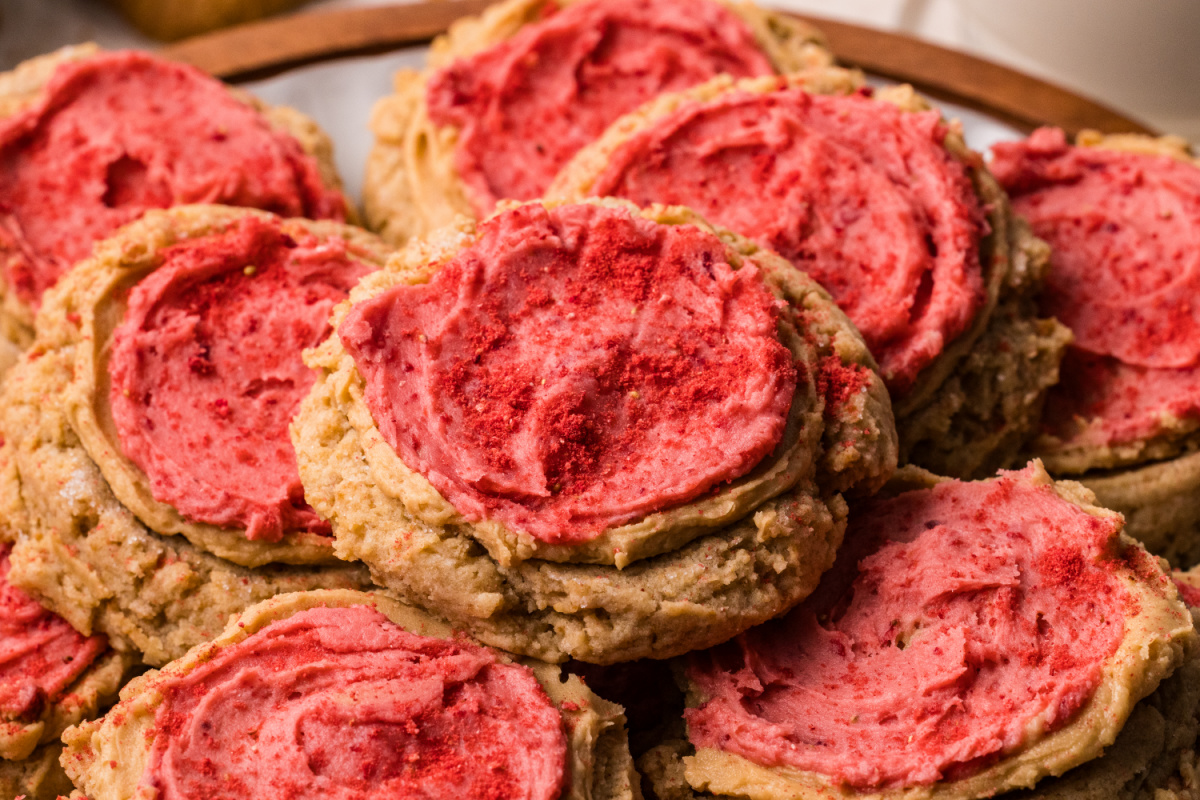 close up of Biscoff butter cookies with strawberry frosting