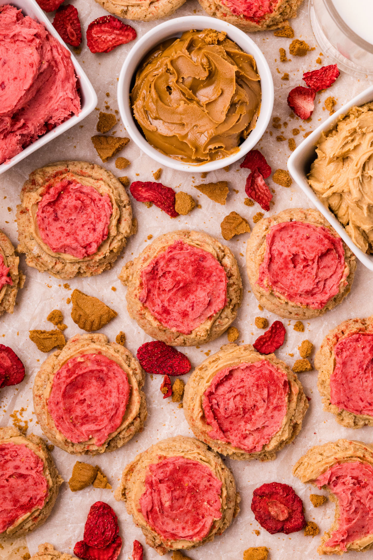Biscoff butter cookies with cookie butter, strawberry frosting, and freeze-dried strawberries