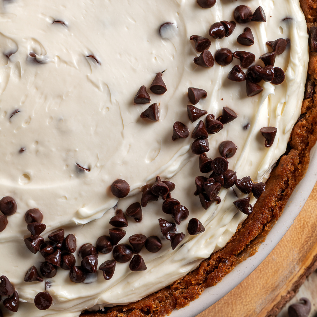 chocolate chip cookie dough crust cheesecake with no-bake filling and chocolate chips