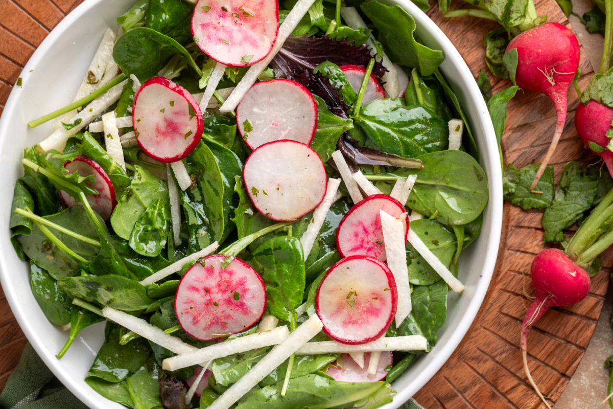 radish and jicama salad with sliced radishes, jicama sticks, and mixed greens