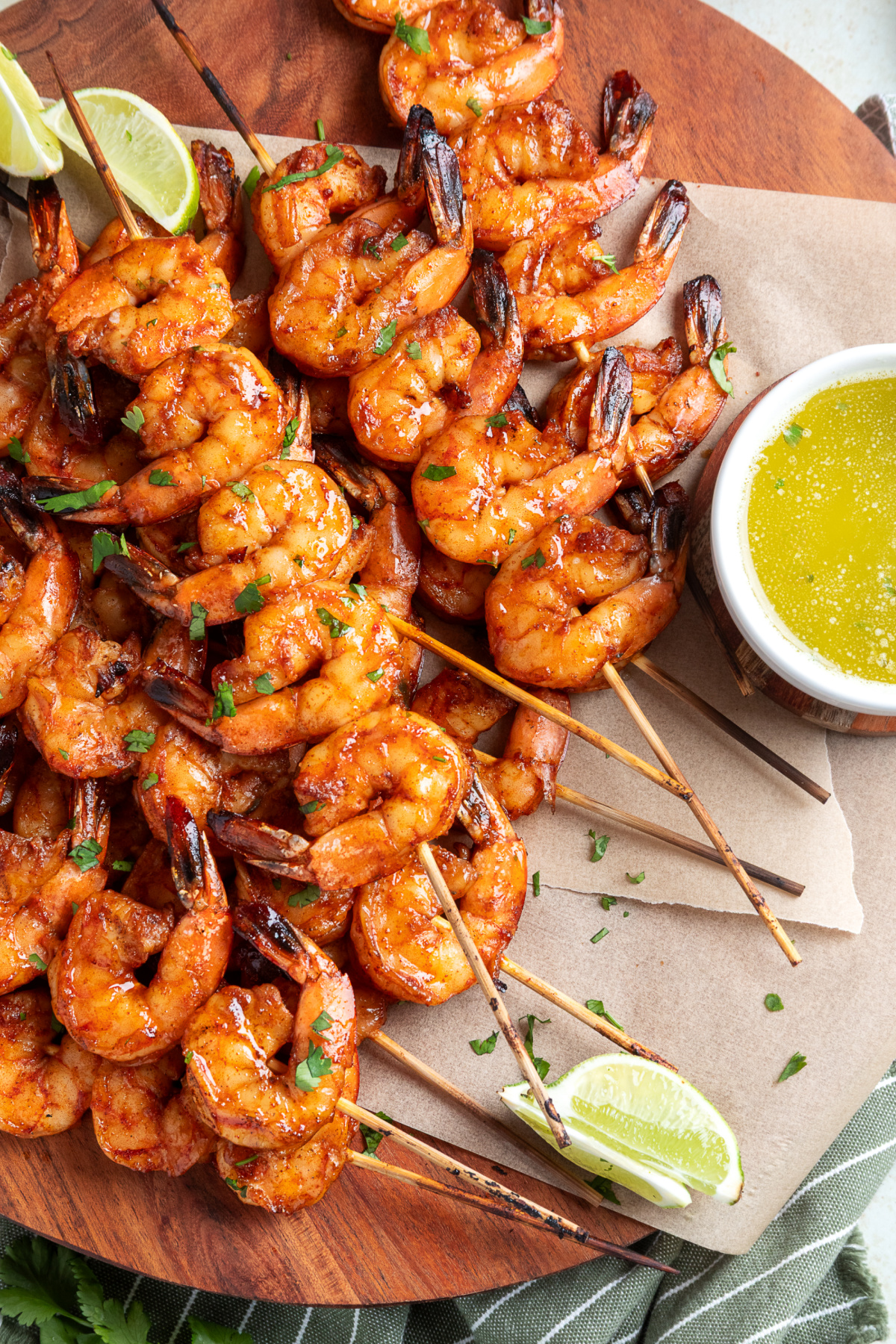 Chipotle honey grilled shrimp skewers served with garlic lime butter dipping sauce