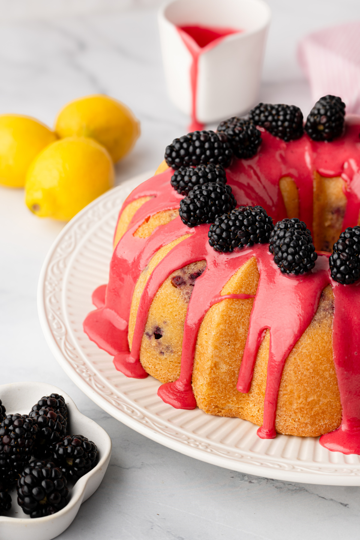 Lemon blackberry Bundt cake with fresh blackberry glaze and a lemon soak Lemon blackberry Bundt cake topped with fresh blackberry glaze and whole blackberries